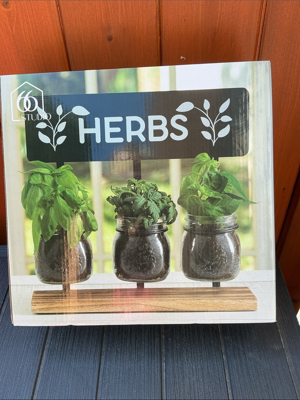 Studio 66 Harper Herb Garden features a black metal and wood stand holding NWT